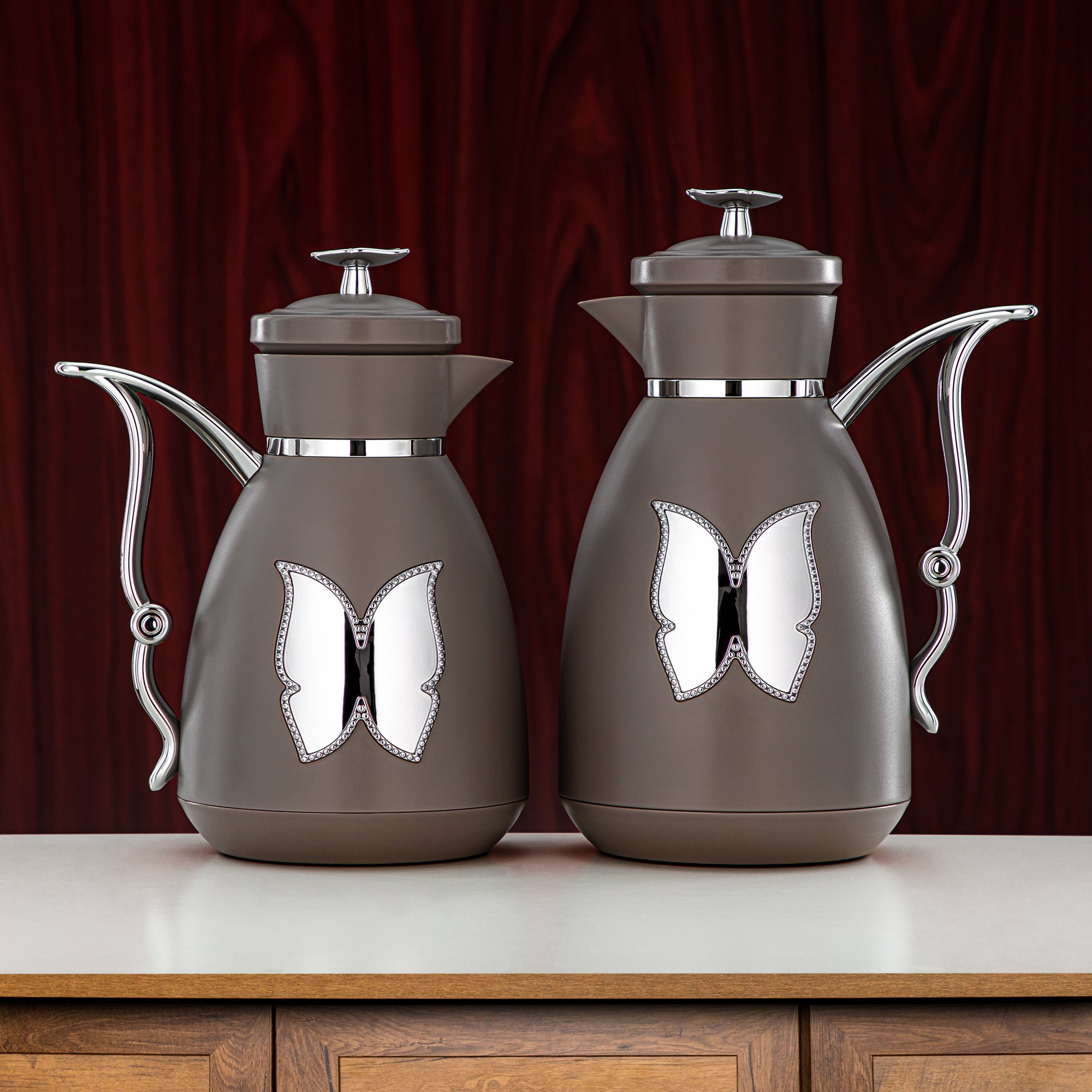 طقم ترامس المرجان بلاستيك زر ضغط 0.7 لتر + 1 لتر قهوة وفضي (SM-2C142-070/100 WG/C) - زجاجة شاي وقهوة