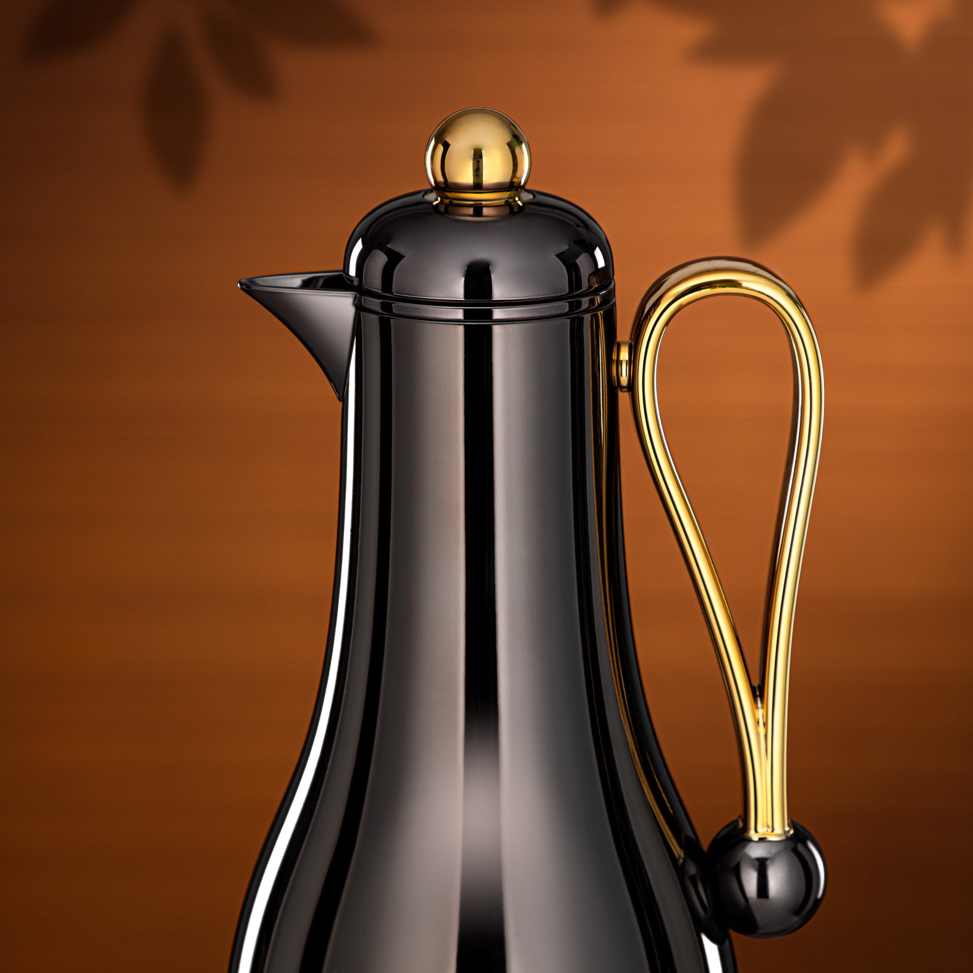 طقم ترامس المرجان 1 لتر + 1 لتر أسود فحمي وذهبي